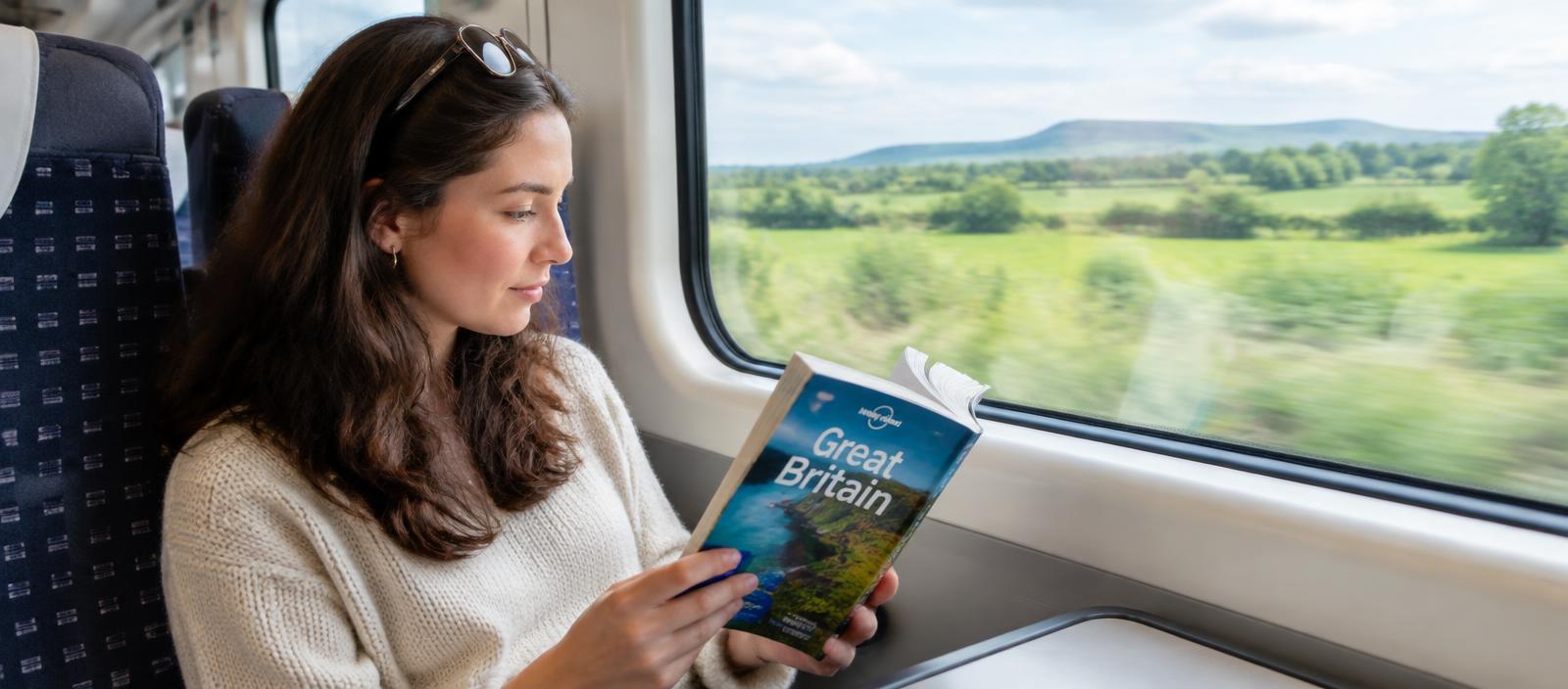 Passenger reading on a UK train
